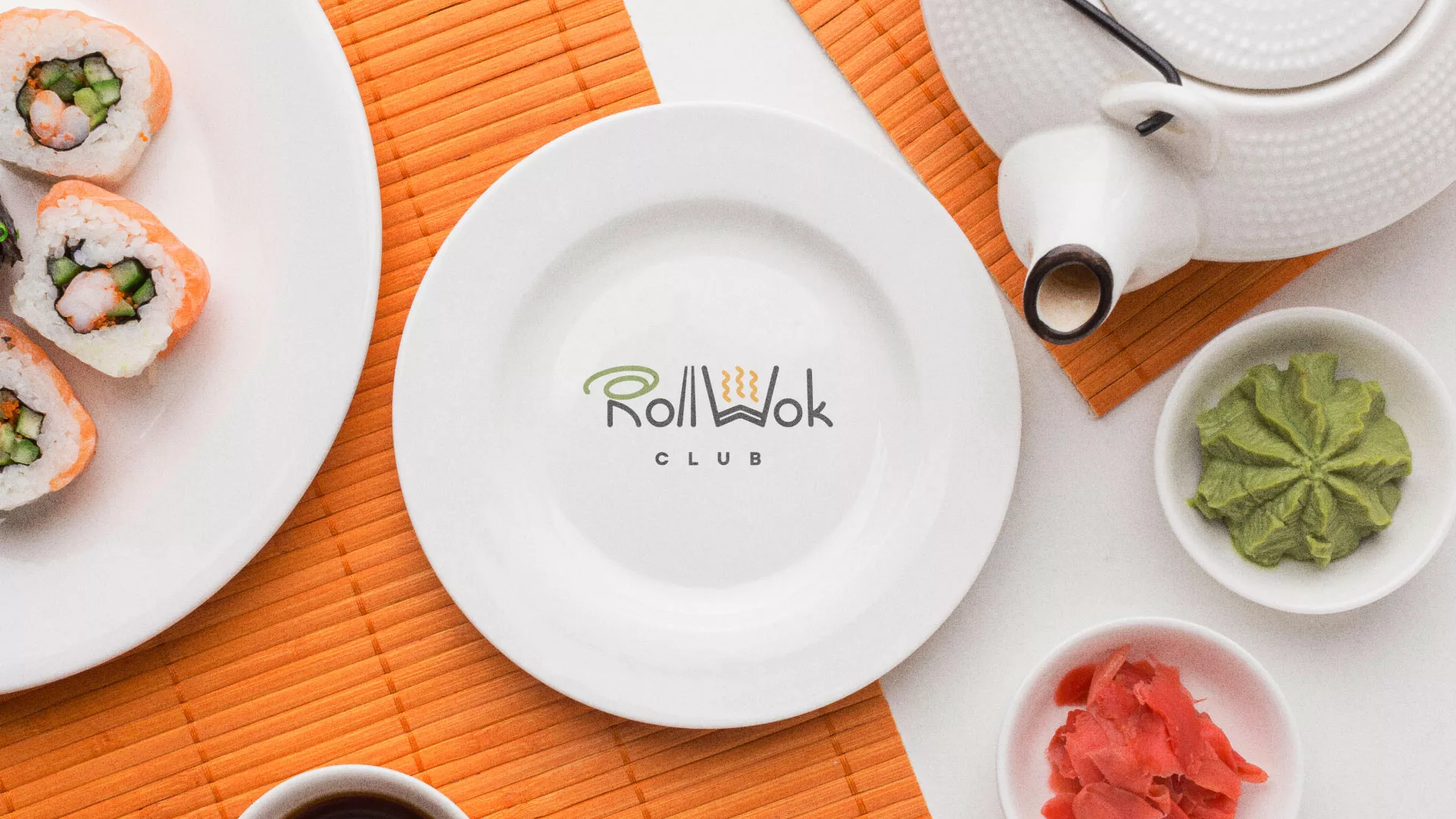 Разработка логотипа и фирменного стиля суши-бара «Roll Wok Club» в Купино